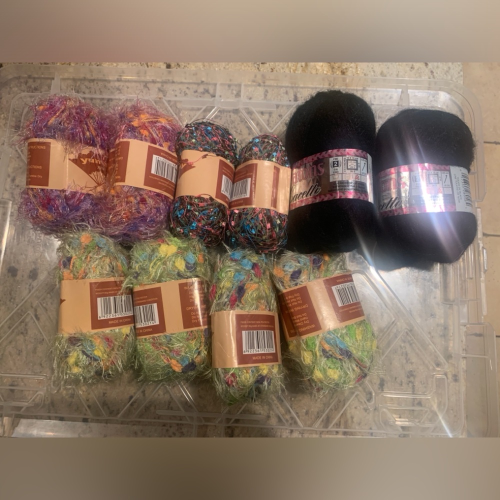 10 skeins of Unused knitting yarn, Each is 50 grams/ 1.7 oz .